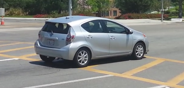 Sample frame as rear wheel of vehicle crosses stop line